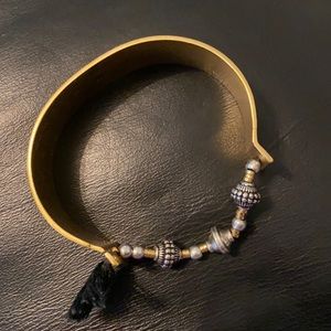 Madewell gold bangle with beads and black tassel